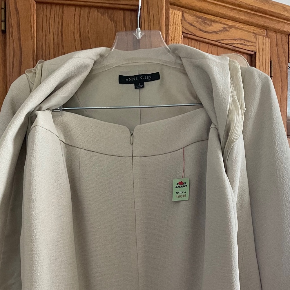 Two piece skirt and full length jacket set